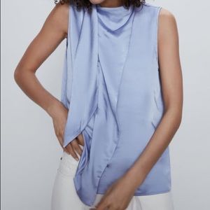Blue satin sleeveless top